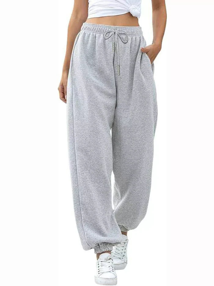 Women's pocketed joggers with a loose silhouette and drawstring detail for easy styling at home, on errands and during travel