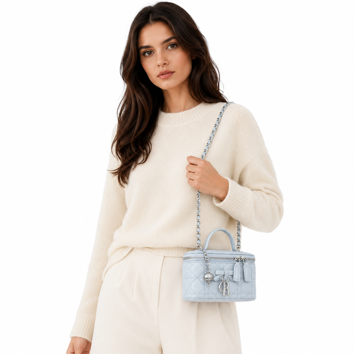 Women's mini PU leather crossbody bag with top handle and compact 6.9-inch length for polished everyday outfit styling ideas.
