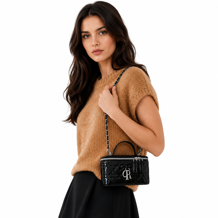 Women's compact crossbody bag in PU leather with a top handle and mini 6.9-inch length for simple day-to-night styling ideas.