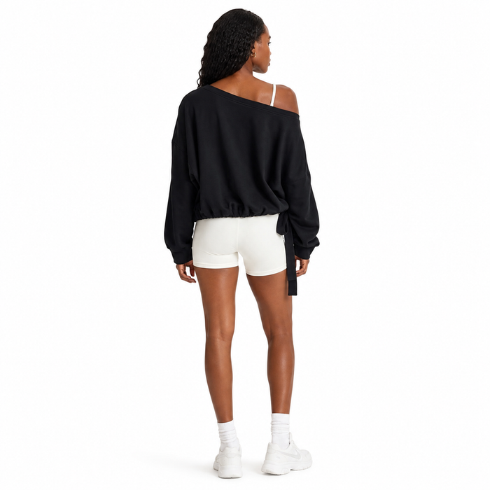 Women's loose fit pullover hoodie in black, back studio view