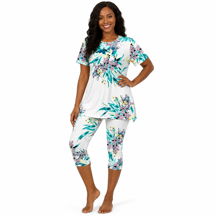 Women's floral capri set in navy blue with printed T-shirt and matching capri pants for casual resort and travel looks today.