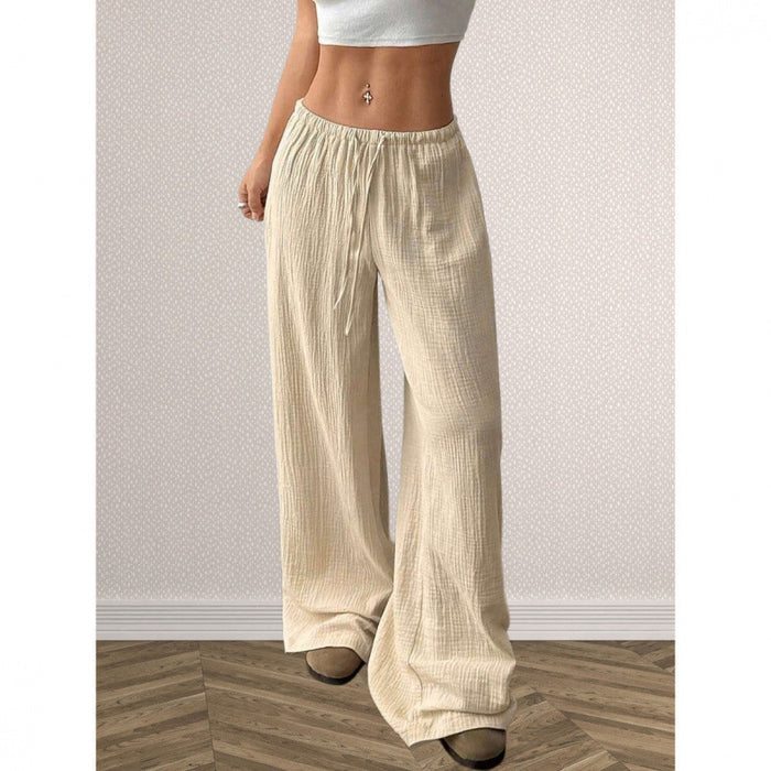 Women's wrinkled finish wide leg cotton trousers with a solid color design and commuter style for easy daily outfit planning.