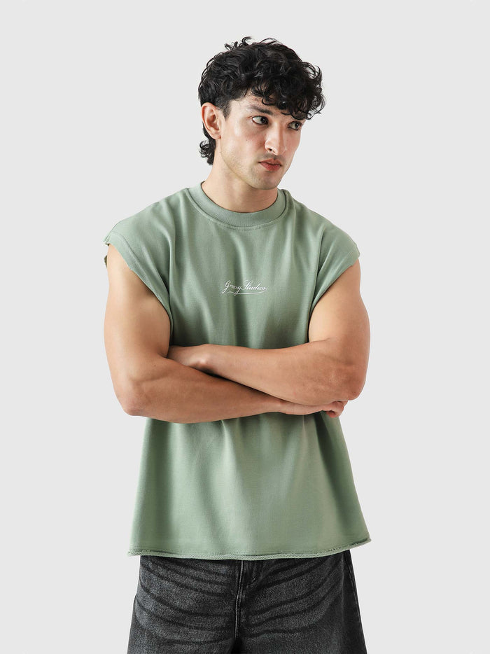 WORLDWIDE mint green sando couple lifestyle shot sleeveless streetwear Pakistan – GROOVY