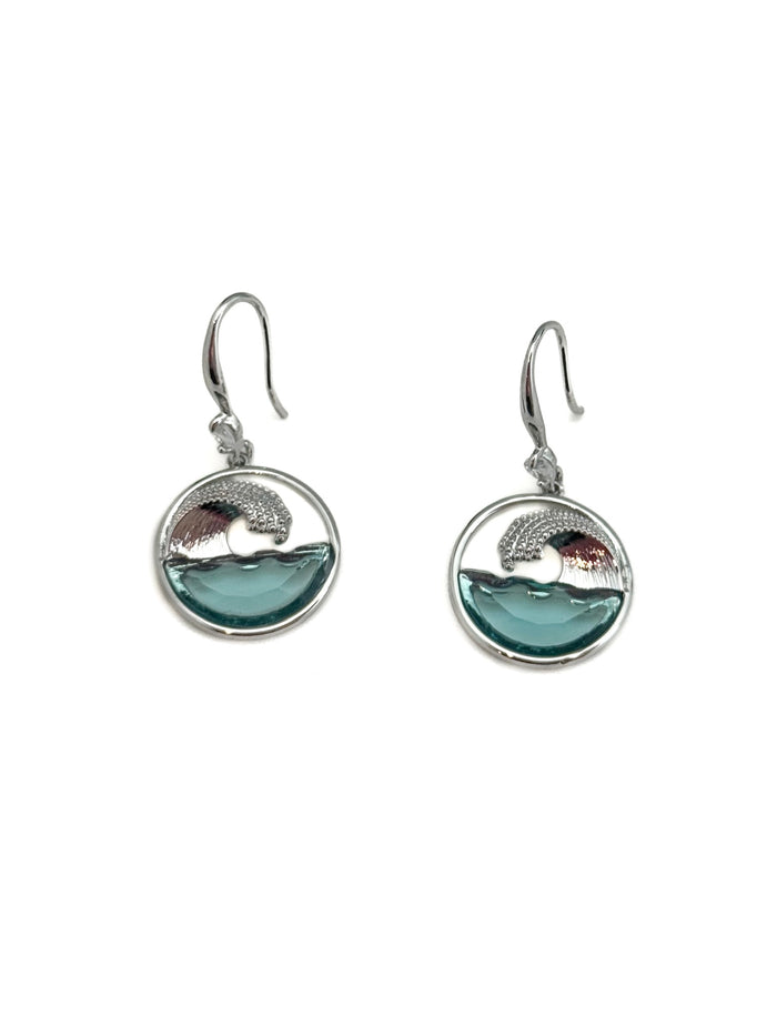 Pair of earrings with wave design and blue accent on a white background