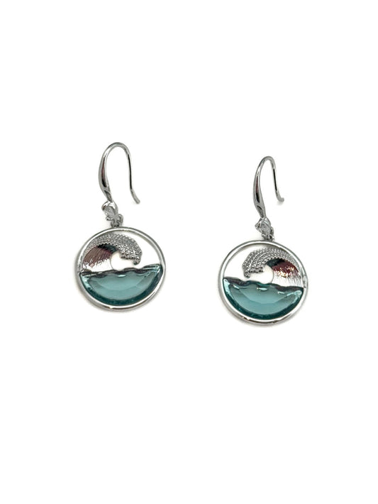 Pair of earrings with wave design and blue accent on a white background